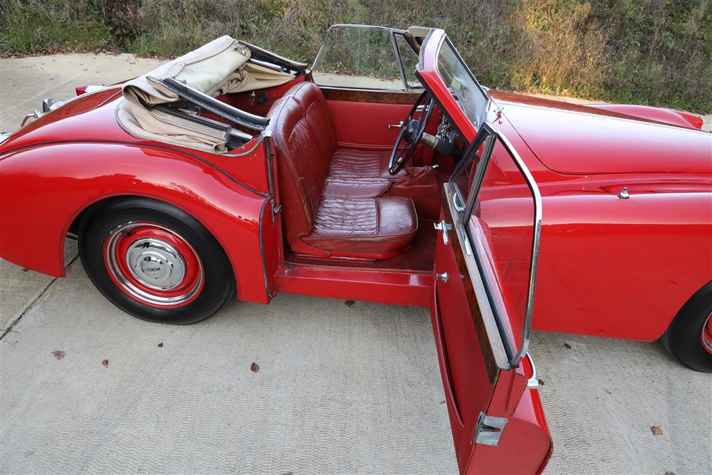 A 1955 Jaguar XK140 DHC